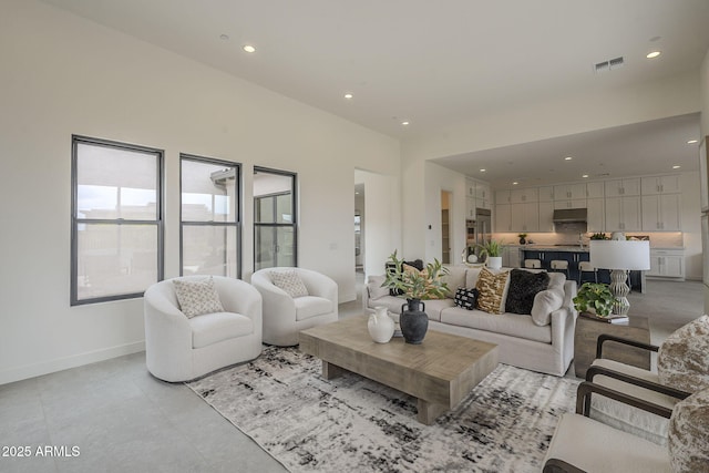 12326 E Black Rock Rd, Scottsdale, AZ 85255 - living room featuring visible vents, baseboards, and recessed lighting