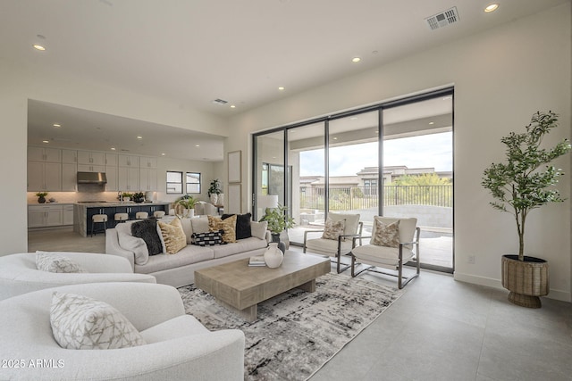 12326 E Black Rock Rd, Scottsdale, AZ 85255 - living area featuring a wealth of natural light, visible vents, and recessed lighting