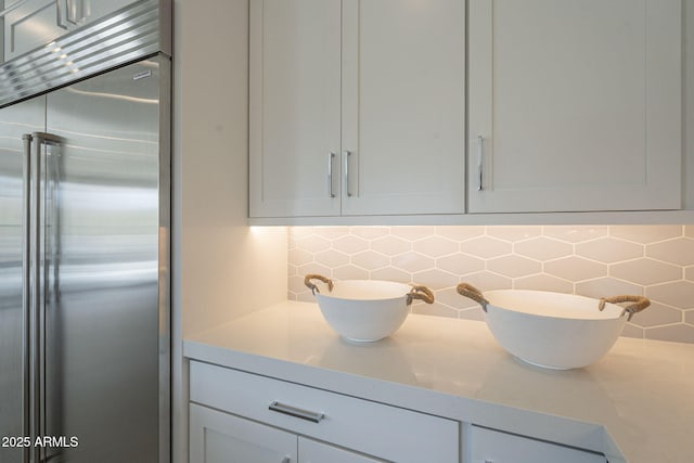 12326 E Black Rock Rd, Scottsdale, AZ 85255 - interior details featuring stainless steel built in fridge, backsplash, and vanity