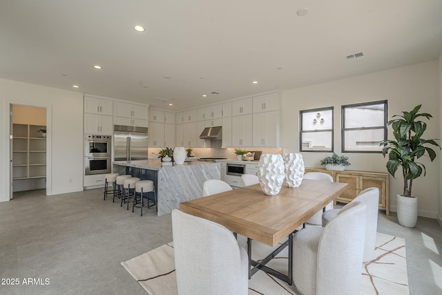 12326 E Black Rock Rd, Scottsdale, AZ 85255 - dining area featuring recessed lighting, visible vents, and baseboards