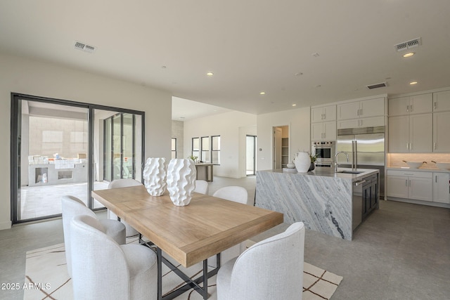 12326 E Black Rock Rd, Scottsdale, AZ 85255 - dining space featuring visible vents and recessed lighting