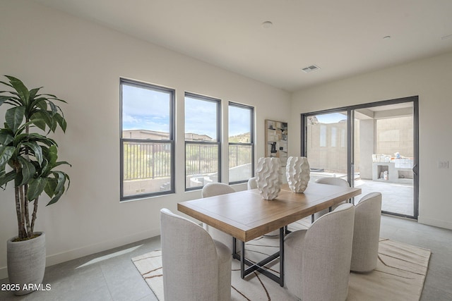12326 E Black Rock Rd, Scottsdale, AZ 85255 - dining space featuring visible vents and baseboards