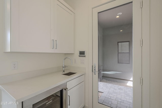 12326 E Black Rock Rd, Scottsdale, AZ 85255 - bar with recessed lighting, beverage cooler, and a sink