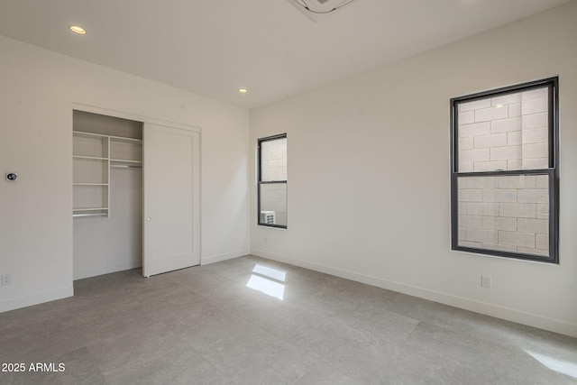 12326 E Black Rock Rd, Scottsdale, AZ 85255 - unfurnished bedroom featuring a closet, baseboards, and recessed lighting