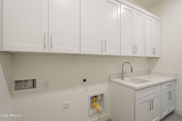 12326 E Black Rock Rd, Scottsdale, AZ 85255 - clothes washing area with a sink, hookup for a gas dryer, cabinet space, electric dryer hookup, and hookup for a washing machine