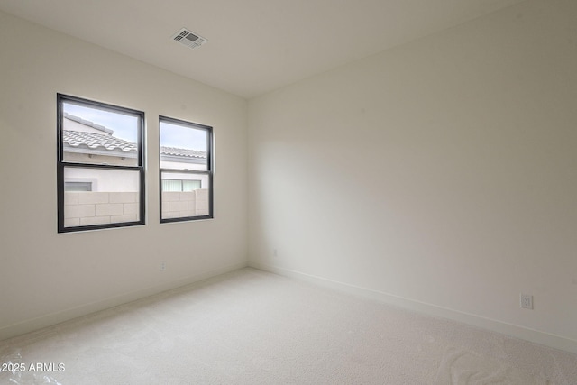12326 E Black Rock Rd, Scottsdale, AZ 85255 - unfurnished room with light carpet, baseboards, and visible vents