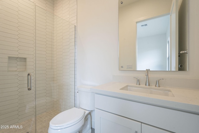12326 E Black Rock Rd, Scottsdale, AZ 85255 - full bathroom featuring toilet, vanity, visible vents, and a stall shower