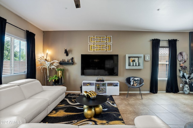 living room with light tile patterned flooring