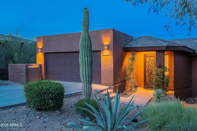 16336 E Ridgeline Dr, Fountain Hills, AZ 85268 - view of front of house featuring stucco siding and a garage