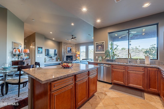 16336 E Ridgeline Dr, Fountain Hills, AZ 85268 - kitchen with a ceiling fan, a sink, dishwasher, stone countertops, and a fireplace
