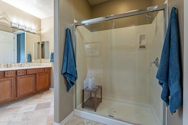 16336 E Ridgeline Dr, Fountain Hills, AZ 85268 - bathroom with baseboards, a shower stall, tile patterned flooring, and vanity
