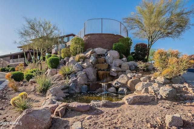 16336 E Ridgeline Dr, Fountain Hills, AZ 85268 - community sign with a garden pond