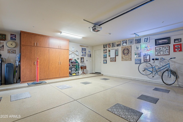 16336 E Ridgeline Dr, Fountain Hills, AZ 85268 - garage featuring baseboards and a garage door opener