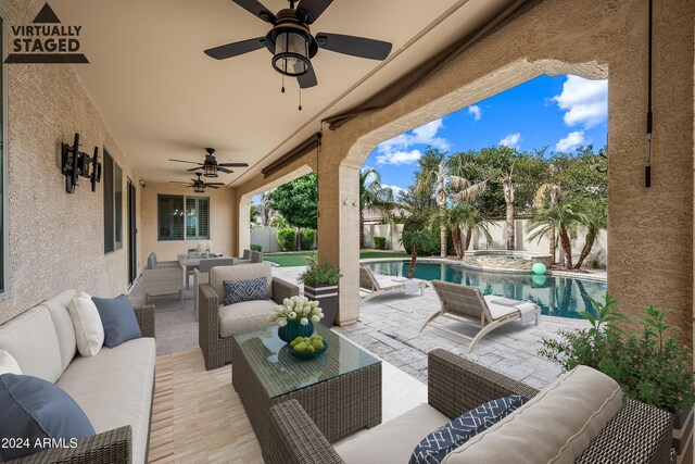 view of patio with an outdoor hangout area and ceiling fan