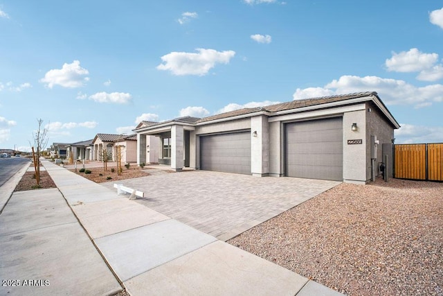 single story home with a garage