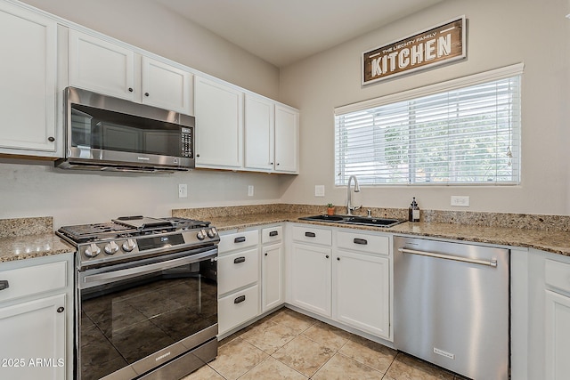 1482 S Banning St, Gilbert, AZ 85296 - kitchen with appliances with stainless steel finishes, a sink, and white cabinetry