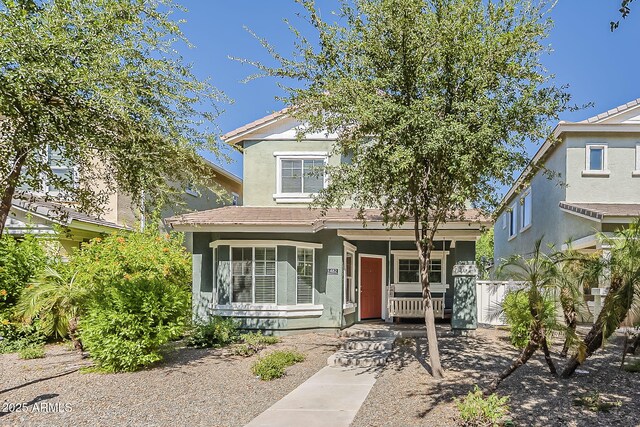 1482 S Banning St, Gilbert, AZ 85296 - view of front facade featuring a porch, stucco siding, and a tile roof