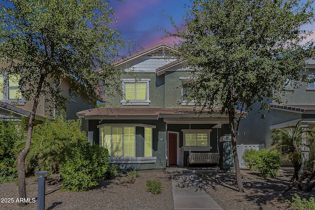 1482 S Banning St, Gilbert, AZ 85296 - view of front of house featuring a porch and stucco siding