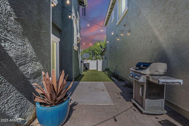 1482 S Banning St, Gilbert, AZ 85296 - patio terrace at dusk featuring grilling area and a patio area