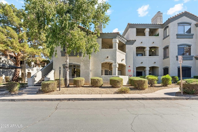 view of property with stairs