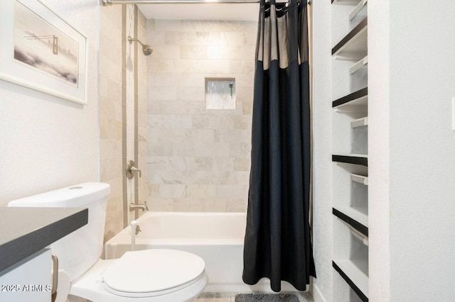 full bathroom with vanity, toilet, and shower / bath combo with shower curtain