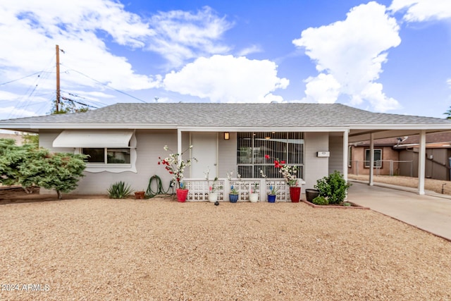 view of front of house featuring a carport