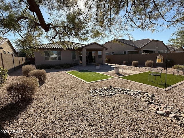 back of house featuring a patio