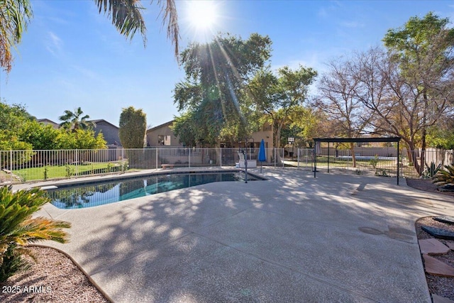 view of swimming pool with a gazebo and a patio area