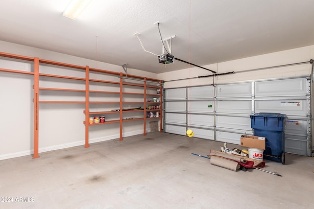 garage featuring a garage door opener