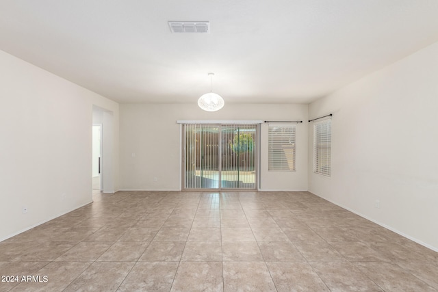 view of tiled empty room