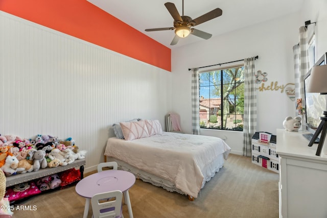 bedroom featuring light carpet and ceiling fan