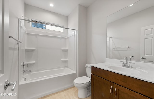 full bathroom featuring shower / bathtub combination, vanity, and toilet