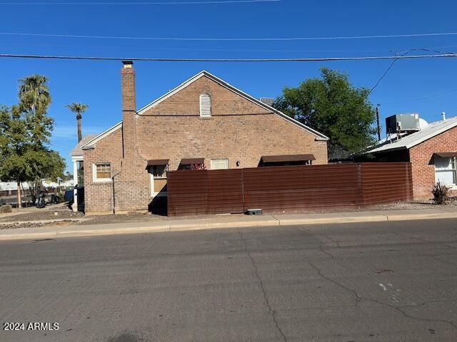 view of home's exterior featuring central AC