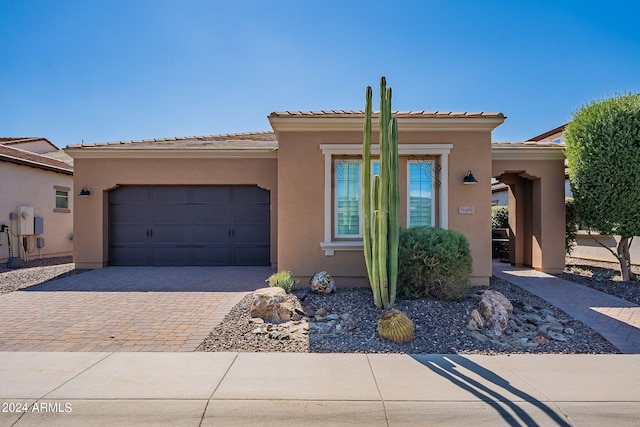 view of front of home with a garage