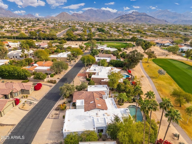 birds eye view of property featuring a mountain view