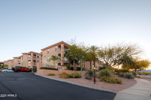 16631 E El Lago Blvd Unit 208, Fountain Hills, AZ 85268 - view of property featuring uncovered parking