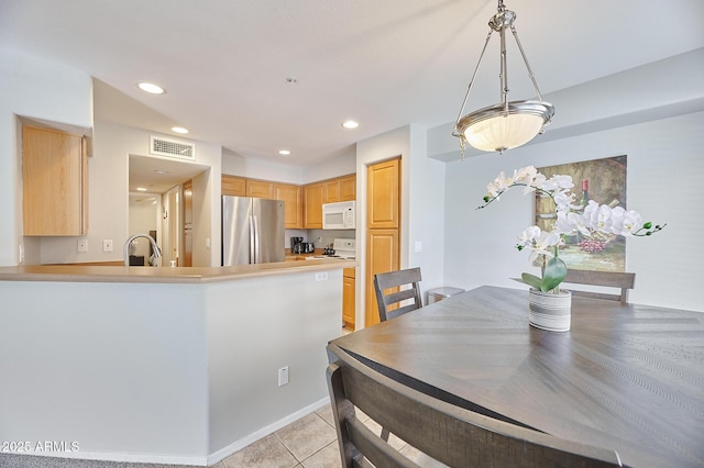 16631 E El Lago Blvd Unit 208, Fountain Hills, AZ 85268 - dining area featuring light tile patterned floors and recessed lighting