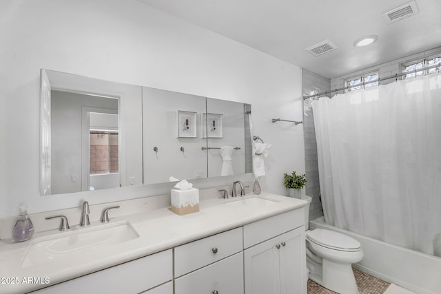 full bath featuring visible vents, a sink, and toilet