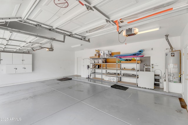 garage featuring a garage door opener and water heater