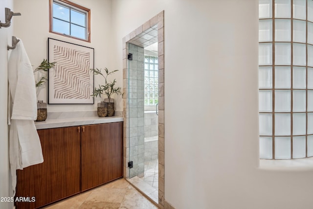 full bathroom featuring a shower stall