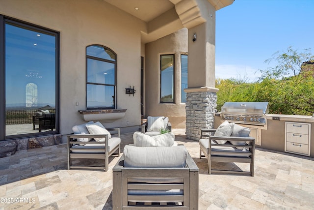 view of patio / terrace with outdoor lounge area and area for grilling
