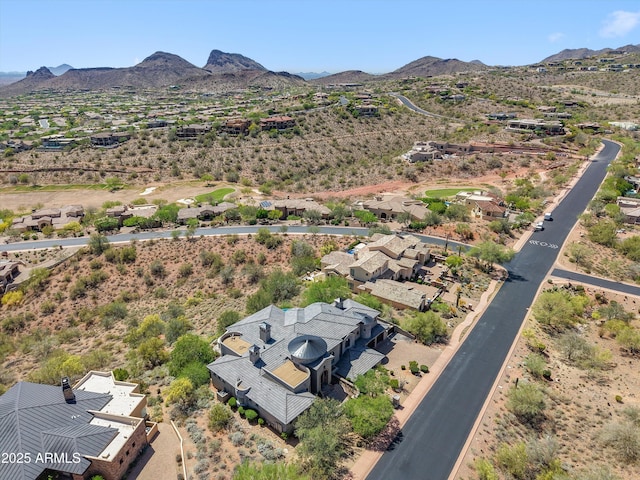 birds eye view of property featuring a residential view, a mountain view, and a desert view