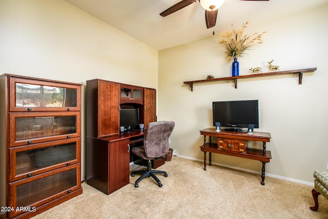 home office featuring ceiling fan and light colored carpet