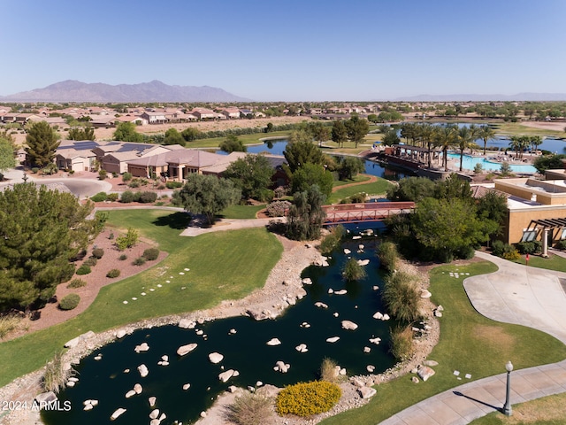 bird's eye view with a water and mountain view