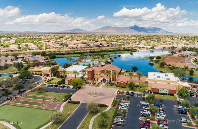 birds eye view of property featuring a residential view and a water and mountain view