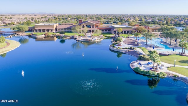 bird's eye view featuring a water view and a residential view