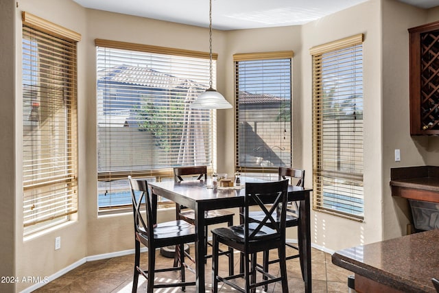 dining room with tile patterned floors