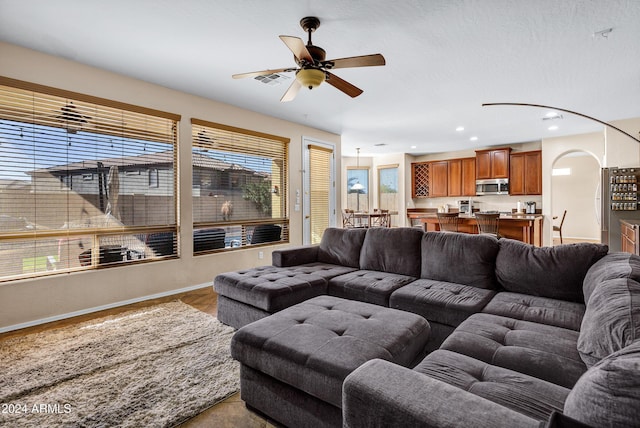 living room featuring ceiling fan