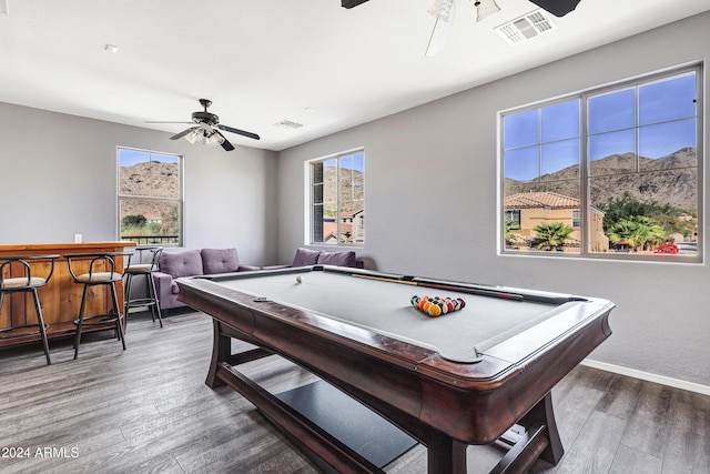 playroom featuring a mountain view, bar area, dark hardwood / wood-style floors, and pool table