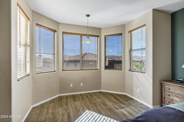 unfurnished bedroom featuring hardwood / wood-style floors